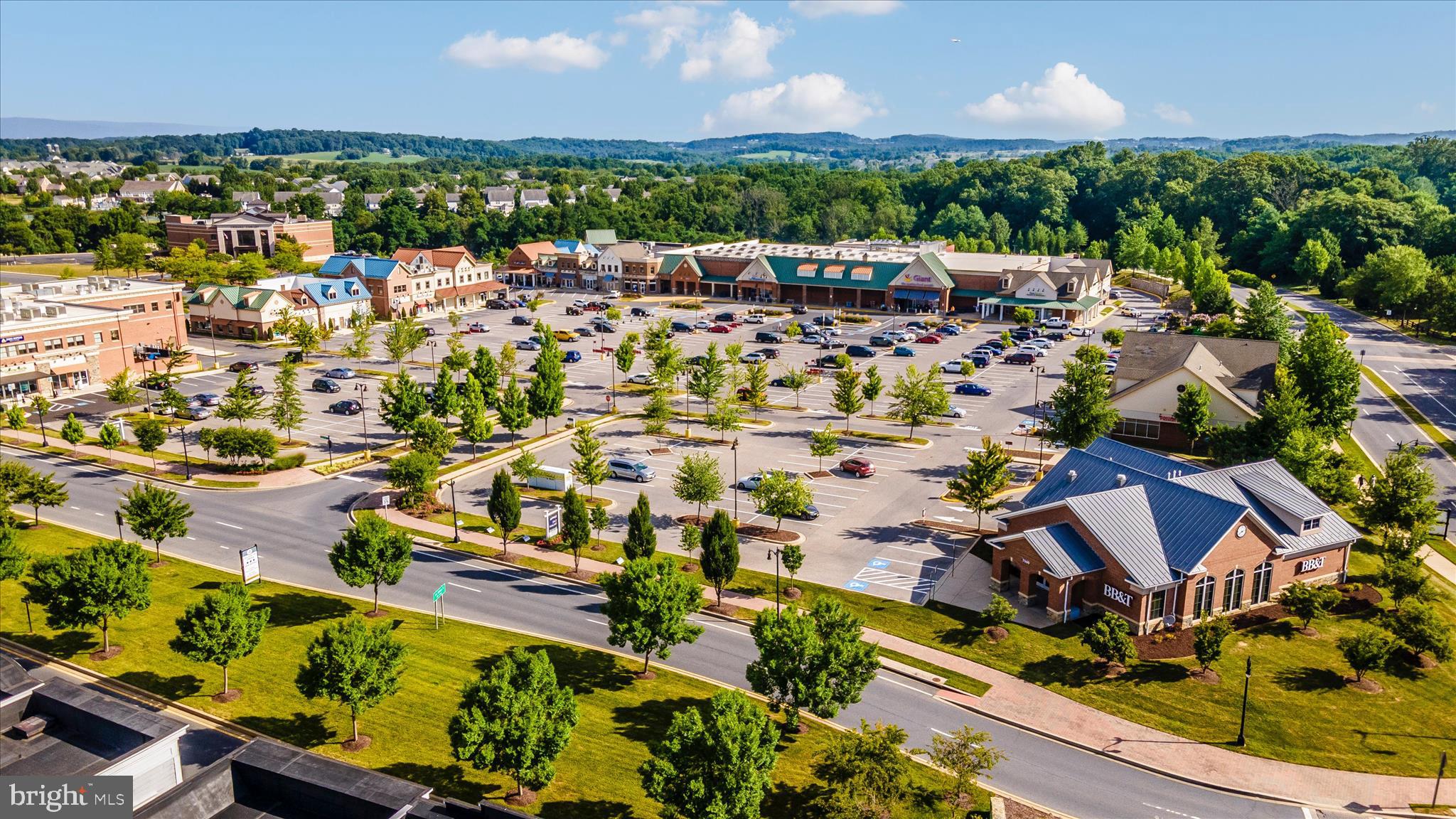 9145 Bealls Farm Road Frederick, MD 21704 - Photo 60 of 88 an aerial view of residential houses with outdoor space and river