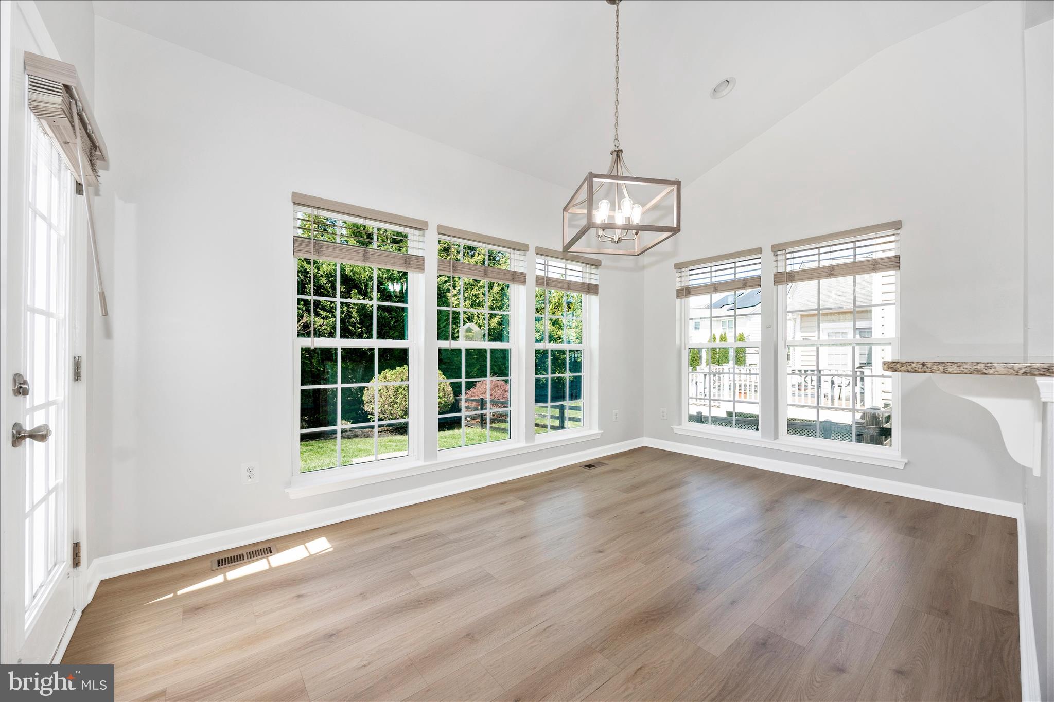 9145 Bealls Farm Road Frederick, MD 21704 - Photo 10 of 88 a view of an empty room with wooden floor and a window