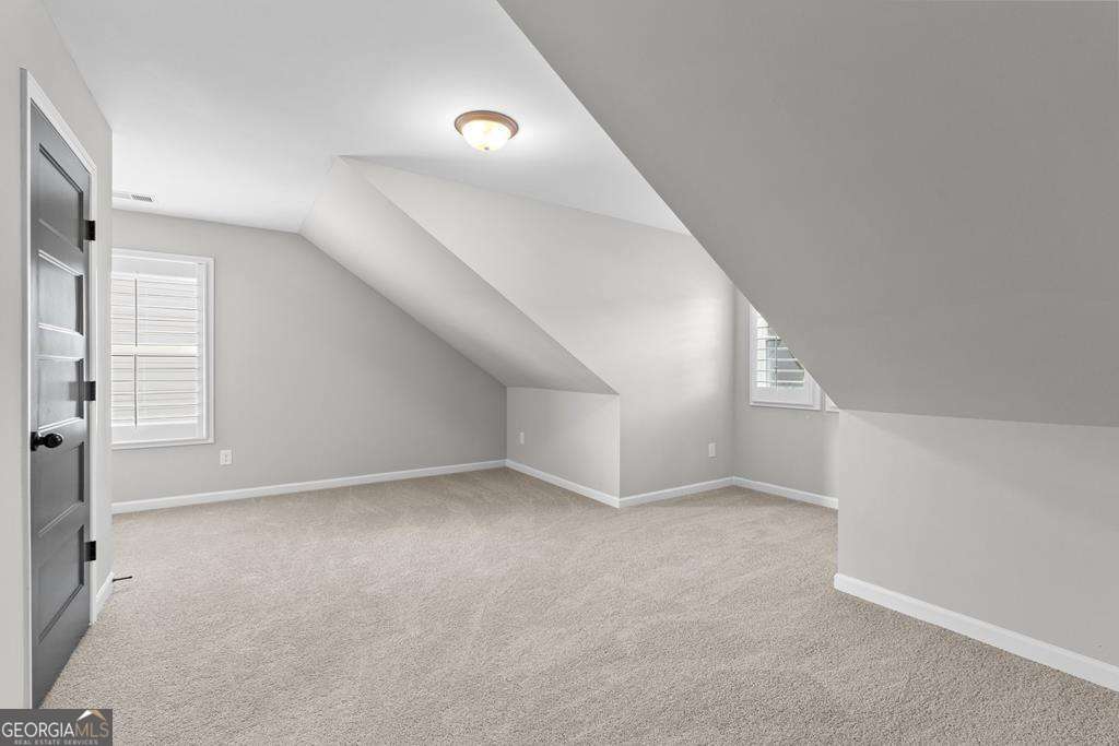 121 Cedar Pk Way Carrollton, GA 30117 - Photo 25 of 33 a view of an empty room with a window