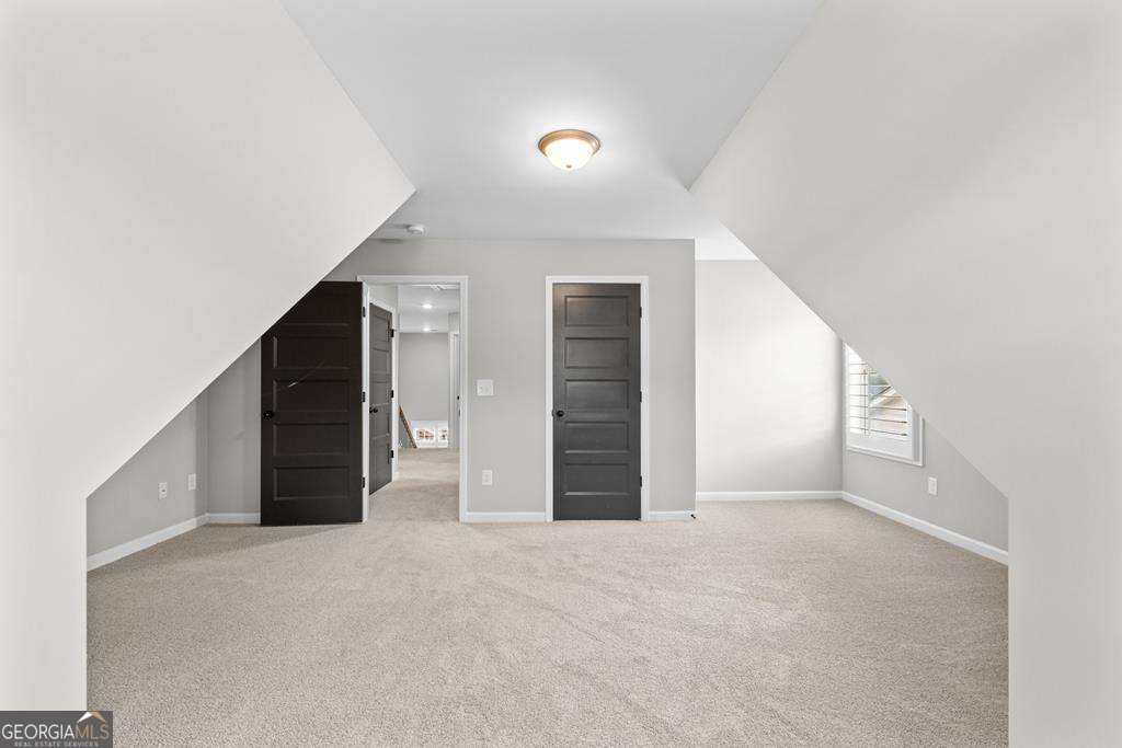 121 Cedar Pk Way Carrollton, GA 30117 - Photo 26 of 33 a view of an empty room with a ceiling fan