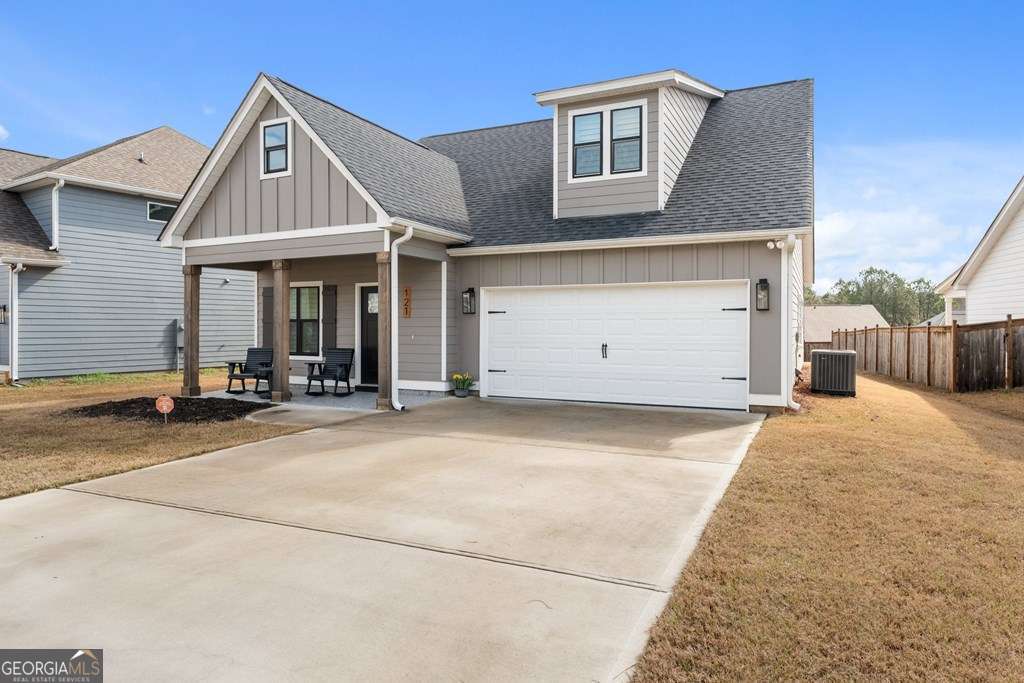 121 Cedar Pk Way Carrollton, GA 30117 - Photo 3 of 33 a house view with a outdoor space