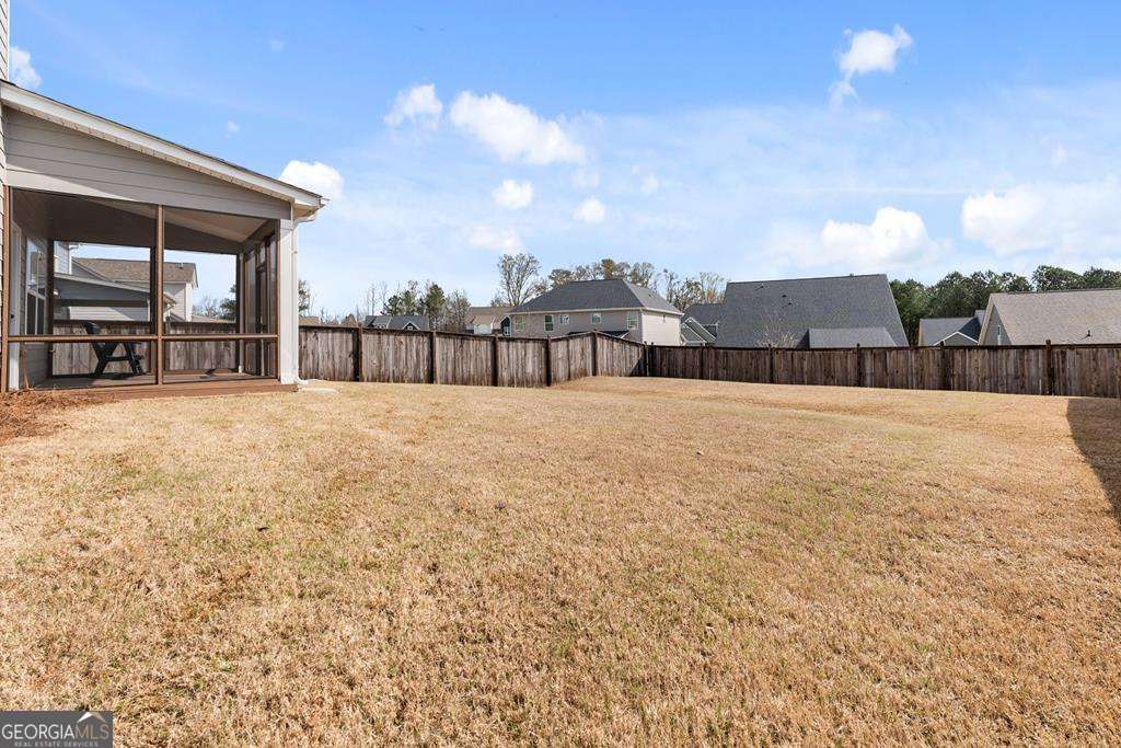 121 Cedar Pk Way Carrollton, GA 30117 - Photo 31 of 33 a view of a house with a yard