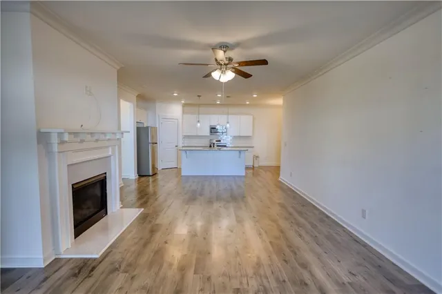 a view of a kitchen and stove top oven