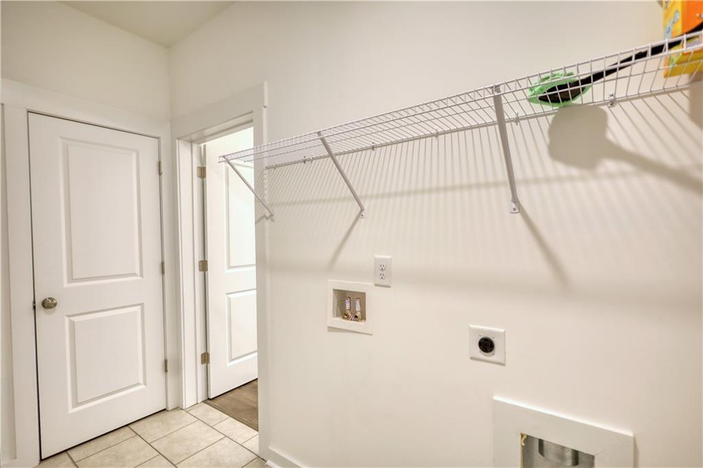 2929 Rambler Drive Loganville, GA 30052 - Photo 27 of 49 a bathroom with a shower and a shower