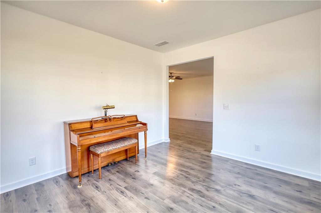2929 Rambler Drive Loganville, GA 30052 - Photo 30 of 49 a room with wooden floor and pool table