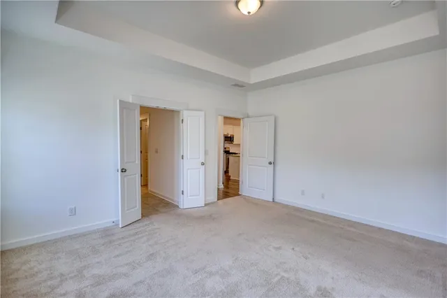 a bedroom with a bed and furniture