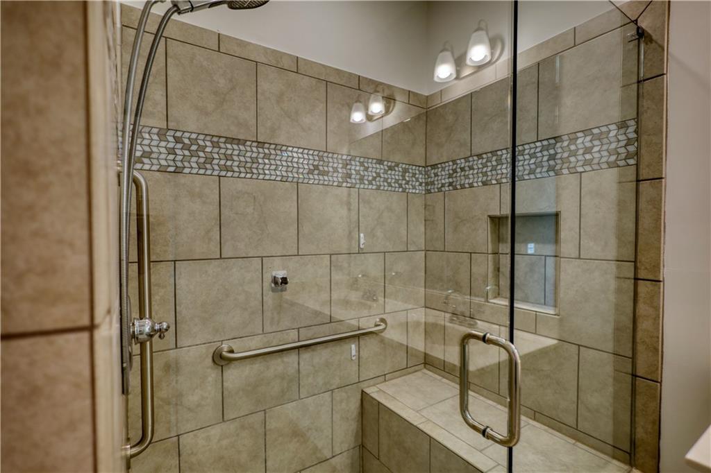 2929 Rambler Drive Loganville, GA 30052 - Photo 38 of 49 a bathroom with a shower