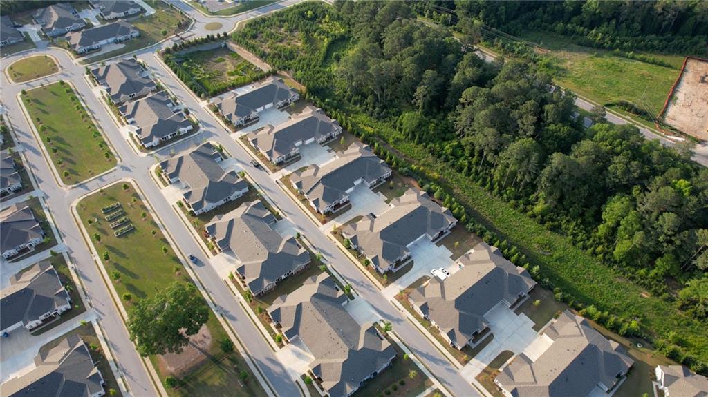 2929 Rambler Drive Loganville, GA 30052 - Photo 5 of 49 an aerial view of a house with a garden