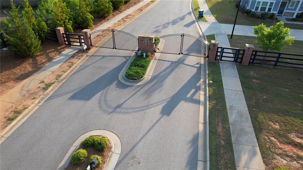 2929 Rambler Drive Loganville, GA 30052 - Photo 8 of 49 a view of a swimming pool with a patio