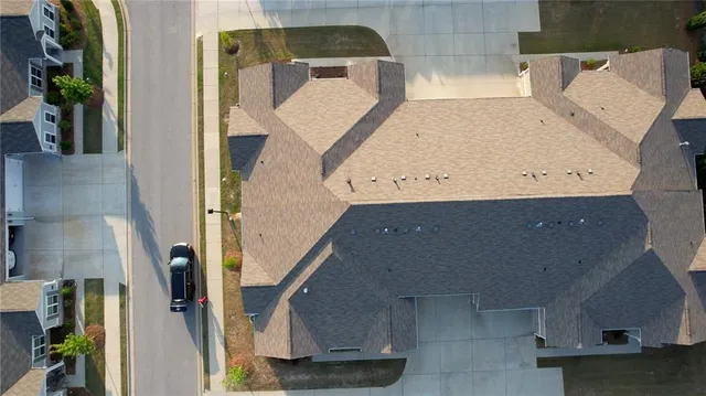 an aerial view of a residential houses