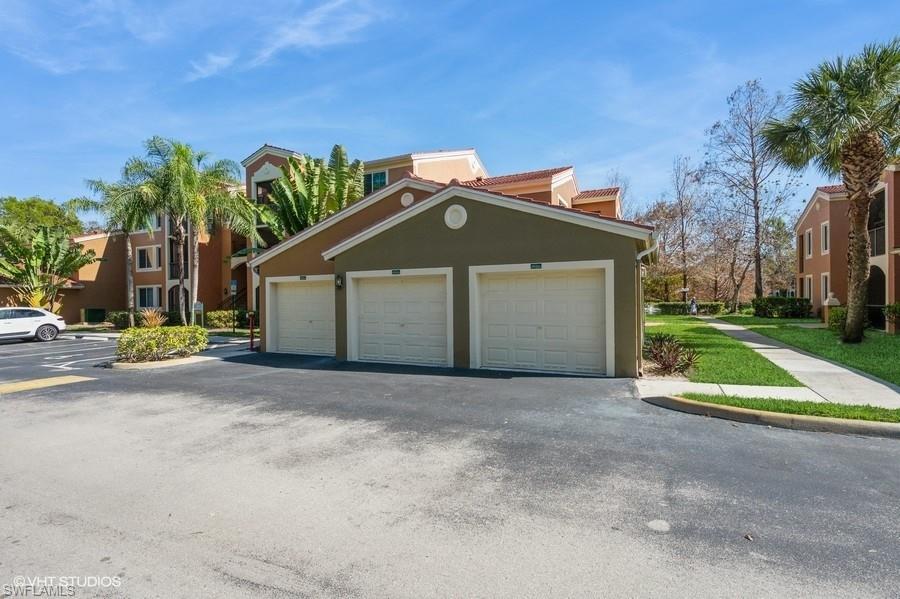 1170 Reserve Way, Unit 107 Naples, FL 34105 - Photo 4 of 41 Sidewalk to Condo
