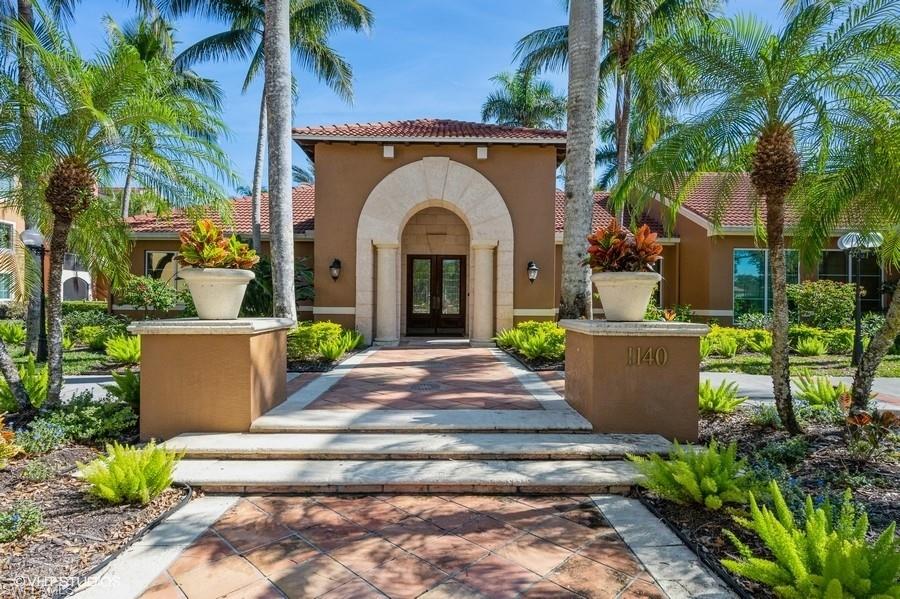 1170 Reserve Way, Unit 107 Naples, FL 34105 - Photo 6 of 41 Front of Clubhouse