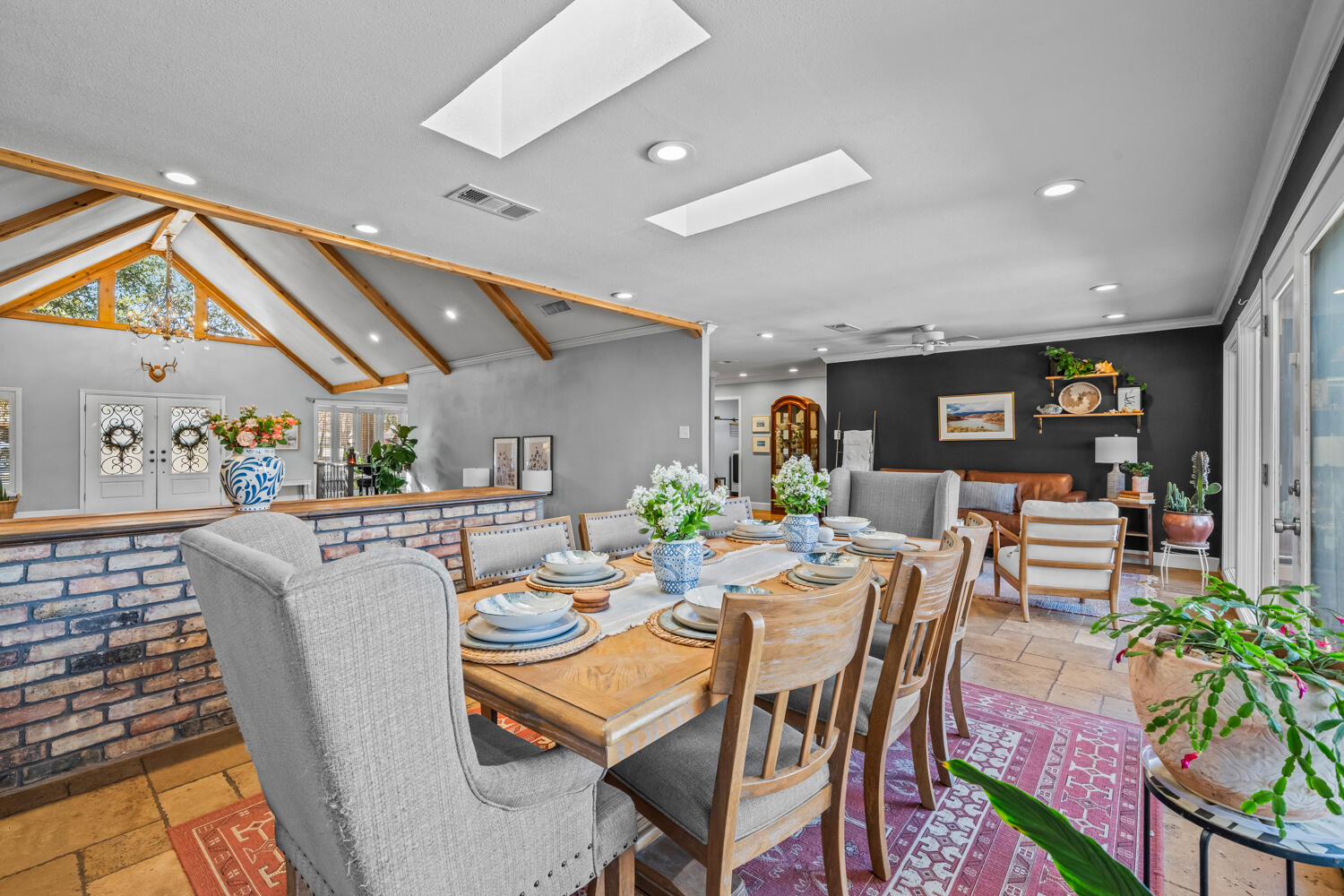 3114 76th Street Lubbock, TX 79423 - Photo 26 of 77 a dining room with furniture and a potted plant