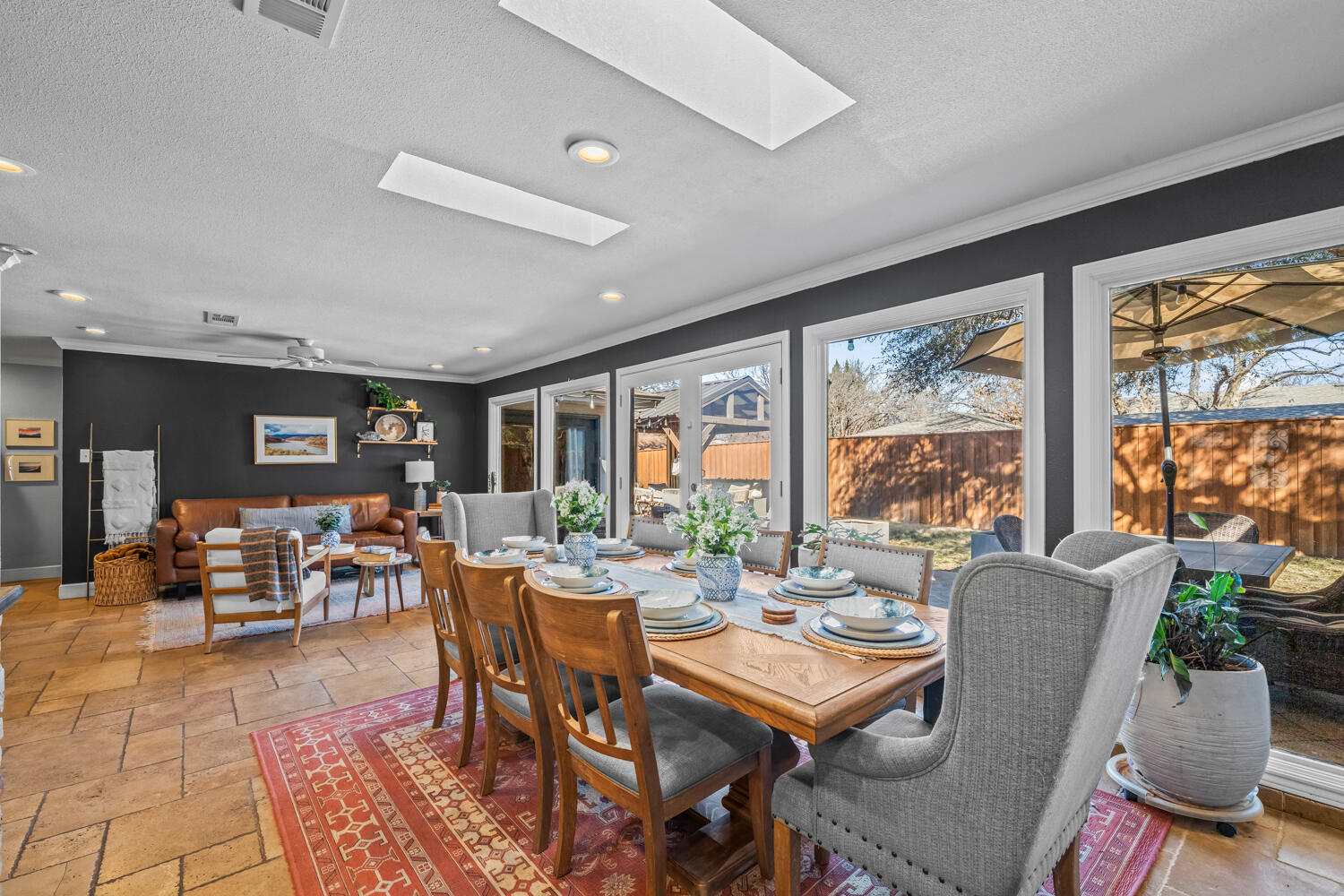 3114 76th Street Lubbock, TX 79423 - Photo 27 of 77 a view of a dining room with furniture window and outside view