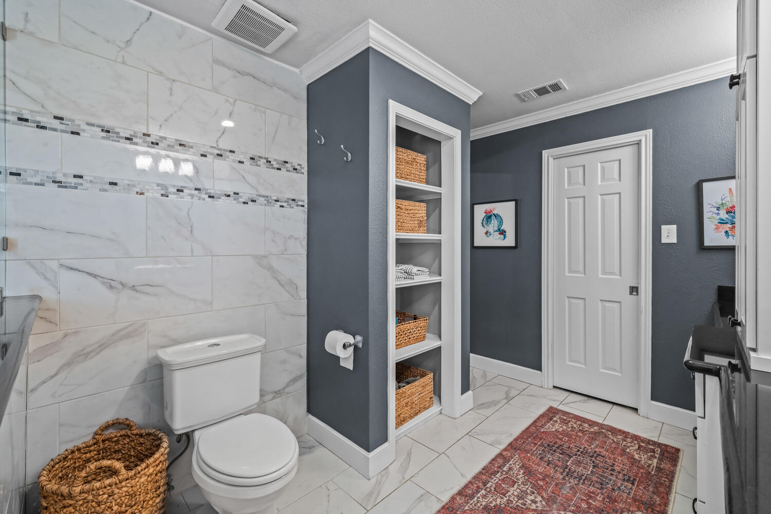 3114 76th Street Lubbock, TX 79423 - Photo 42 of 77 a bathroom with a toilet and a shower