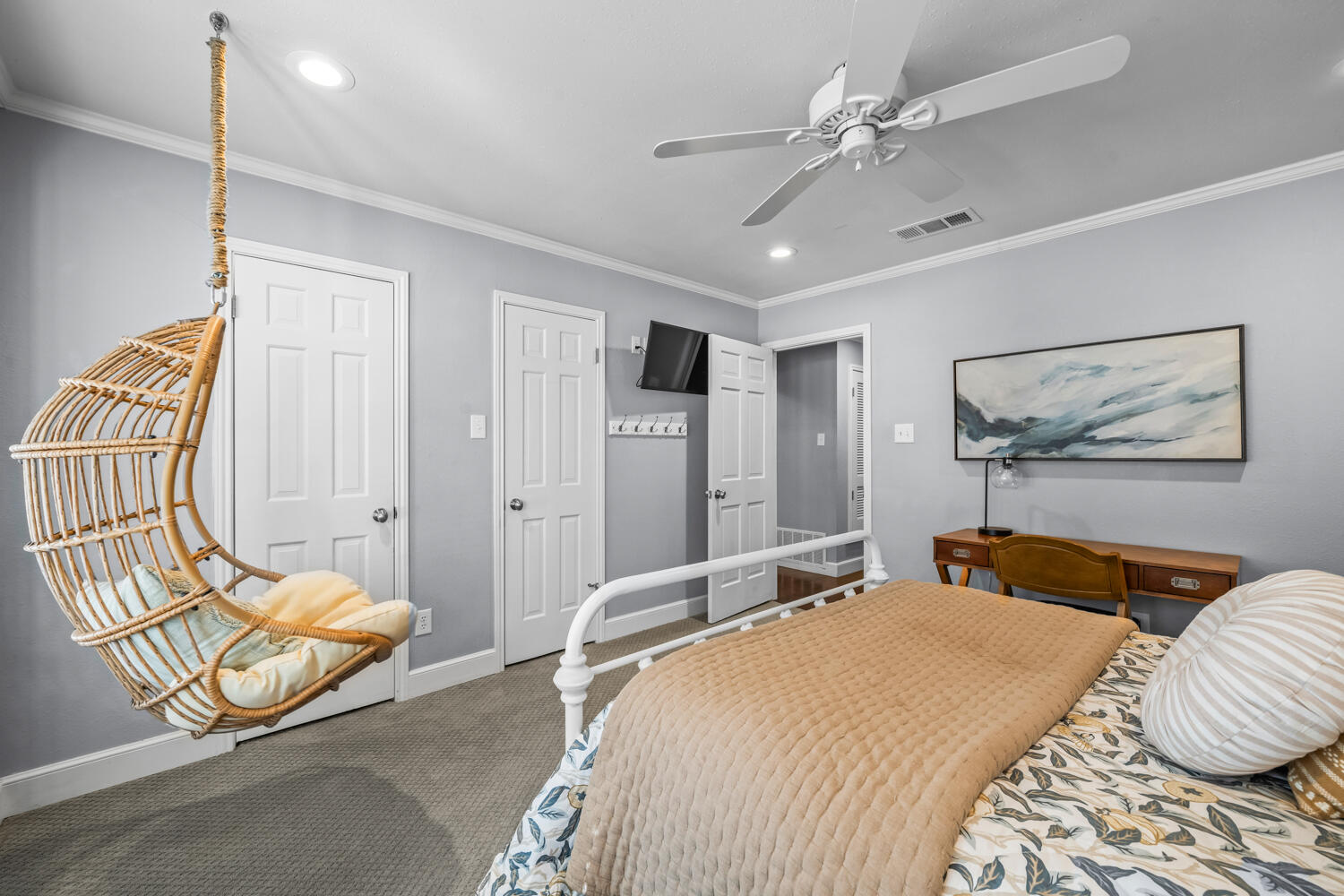3114 76th Street Lubbock, TX 79423 - Photo 62 of 77 a bedroom with a bed and wooden floor