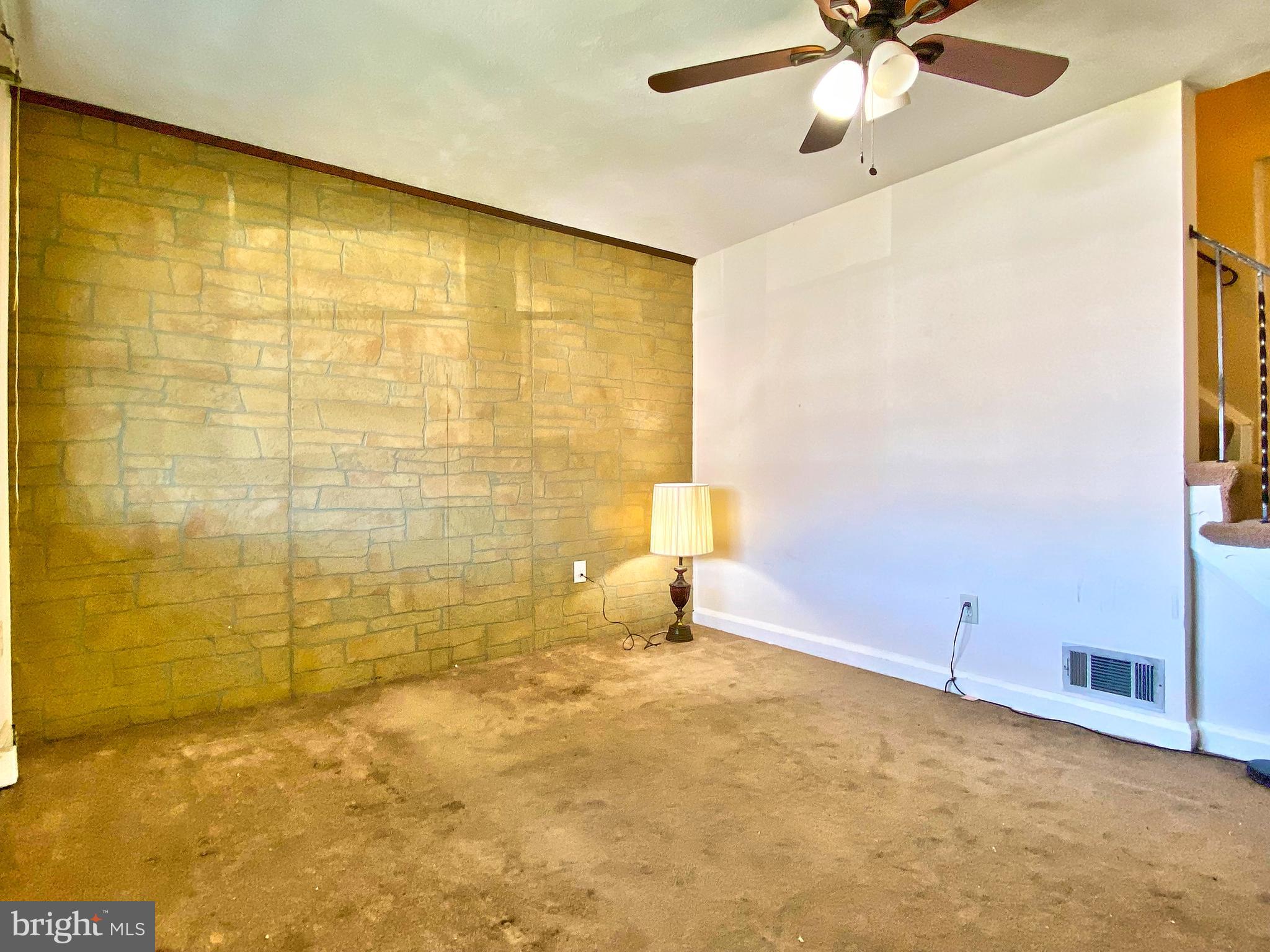 1917 Inverton Road Baltimore, MD 21222 - Photo 14 of 51 a view of a big room with windows