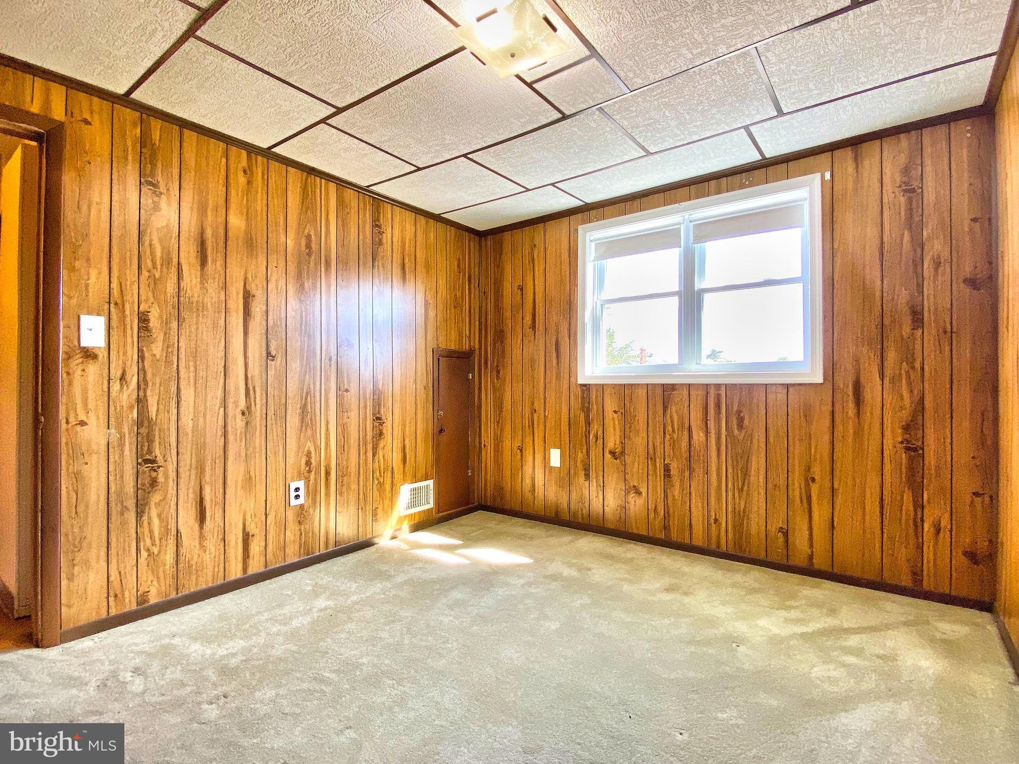 1917 Inverton Road Baltimore, MD 21222 - Photo 36 of 51 a view of an empty room with a window