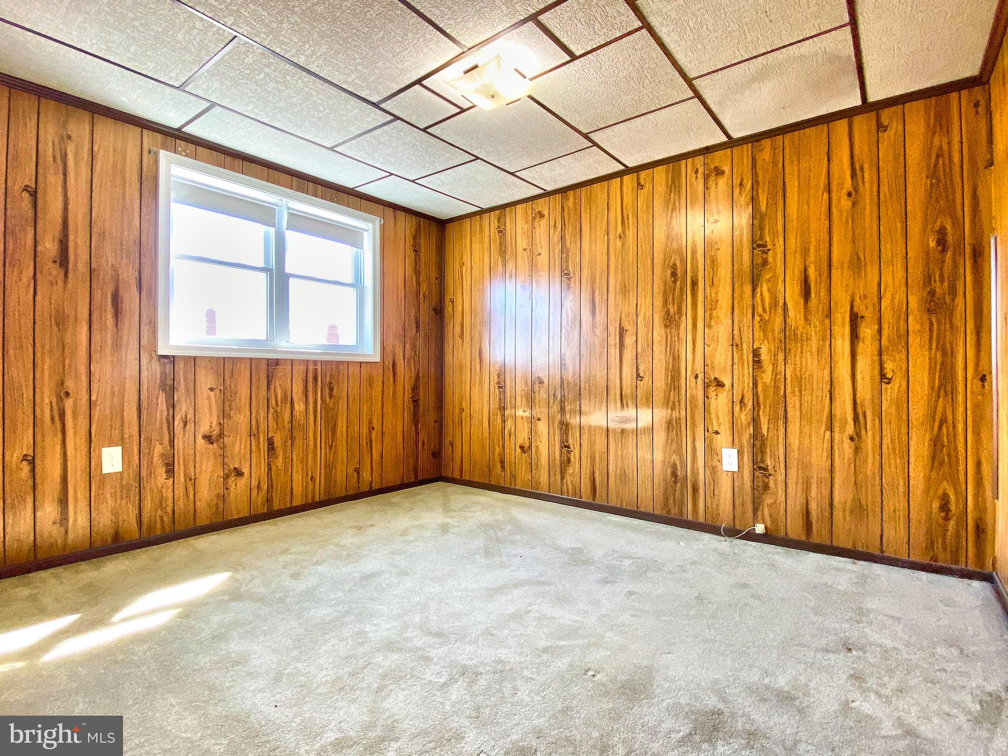 1917 Inverton Road Baltimore, MD 21222 - Photo 38 of 51 a view of an empty room with a window