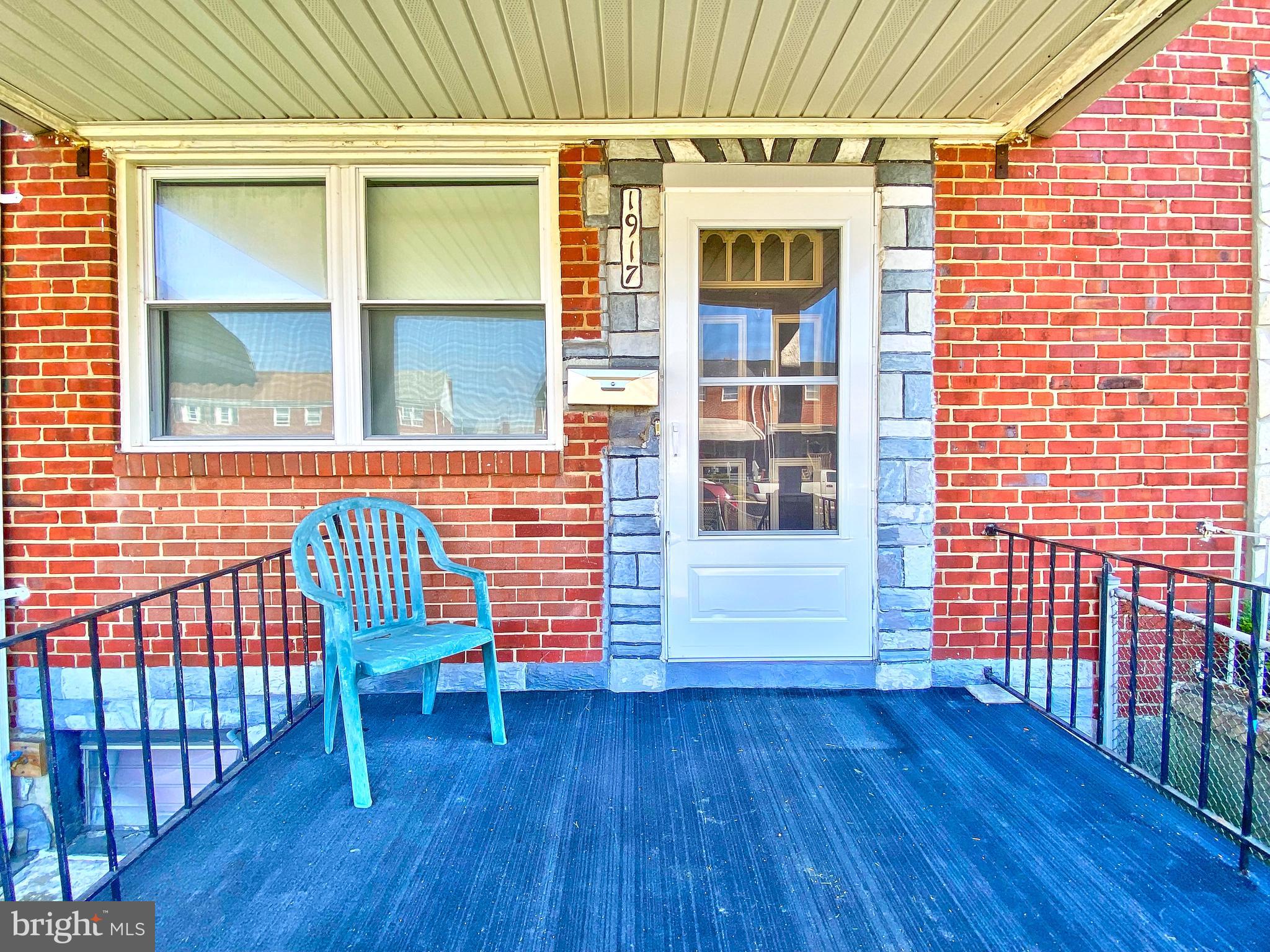1917 Inverton Road Baltimore, MD 21222 - Photo 5 of 51 a front view of a house with a balcony