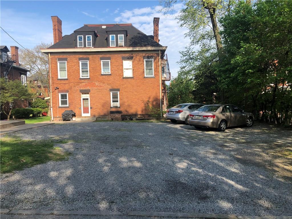 342 South Graham Street Pittsburgh, PA 15232 - Photo 4 of 9 a car parked in front of a house