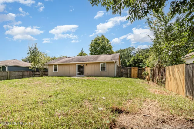 a house view with a garden space