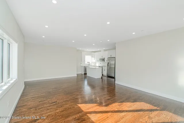 a view of kitchen with a sink and dishwasher