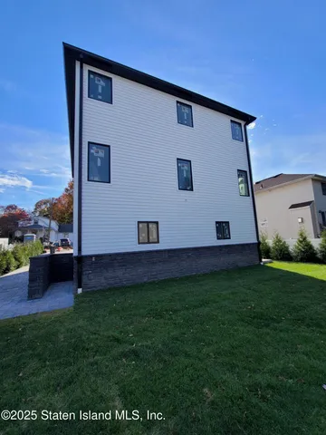 a house view with a garden space