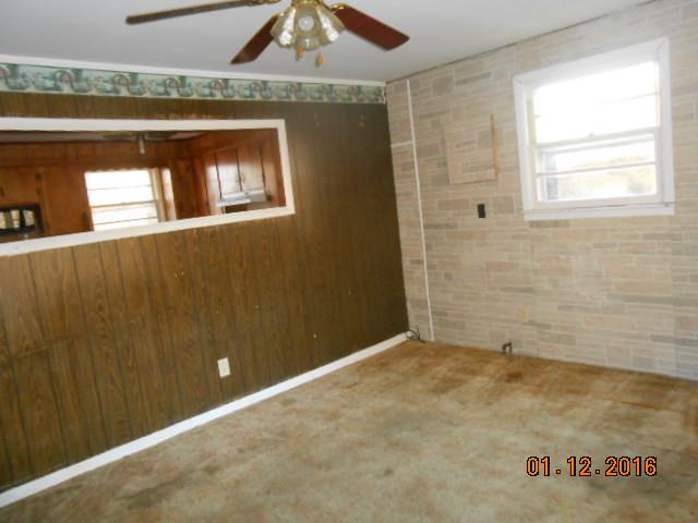 2776 Ridge Drive Nunnelly, TN 37137 - Photo 4 of 11 living room has opening between lr and kitchen