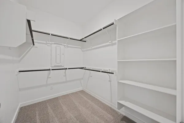 a view of an empty walk in closet