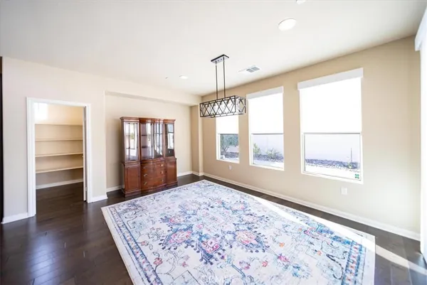 a very nice looking living room with a large window
