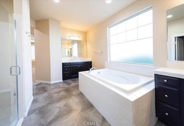 a view of a bathroom from a hallway