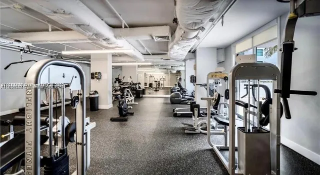 a view of a room with gym equipment