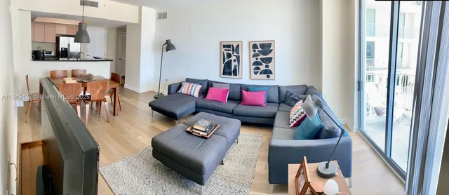 a living room with furniture and a couch