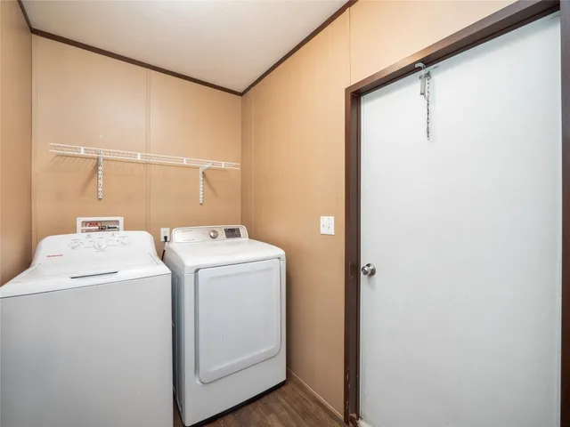 a utility room with dryer and washer