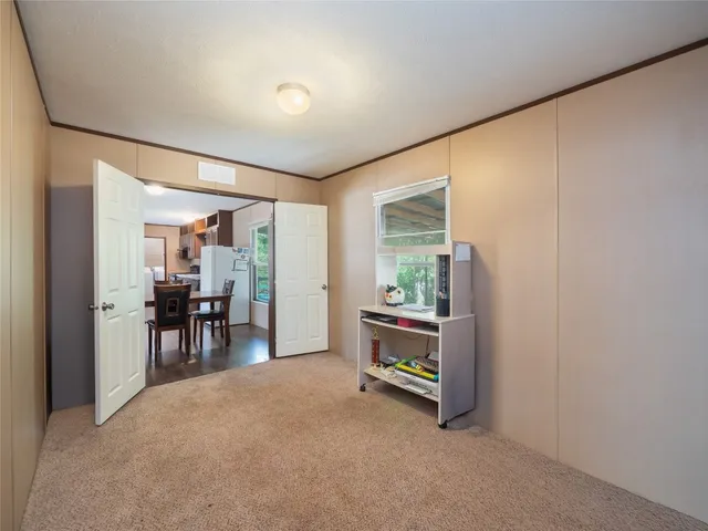 a view of deck with patio and wooden floor