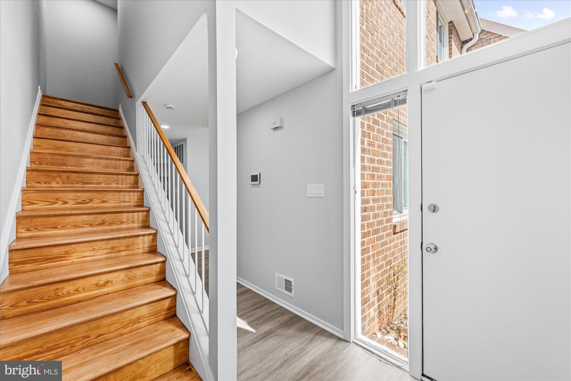 1431 Greenmont Court Reston, VA 20190 - Photo 2 of 15 Light-filled Front Foyer