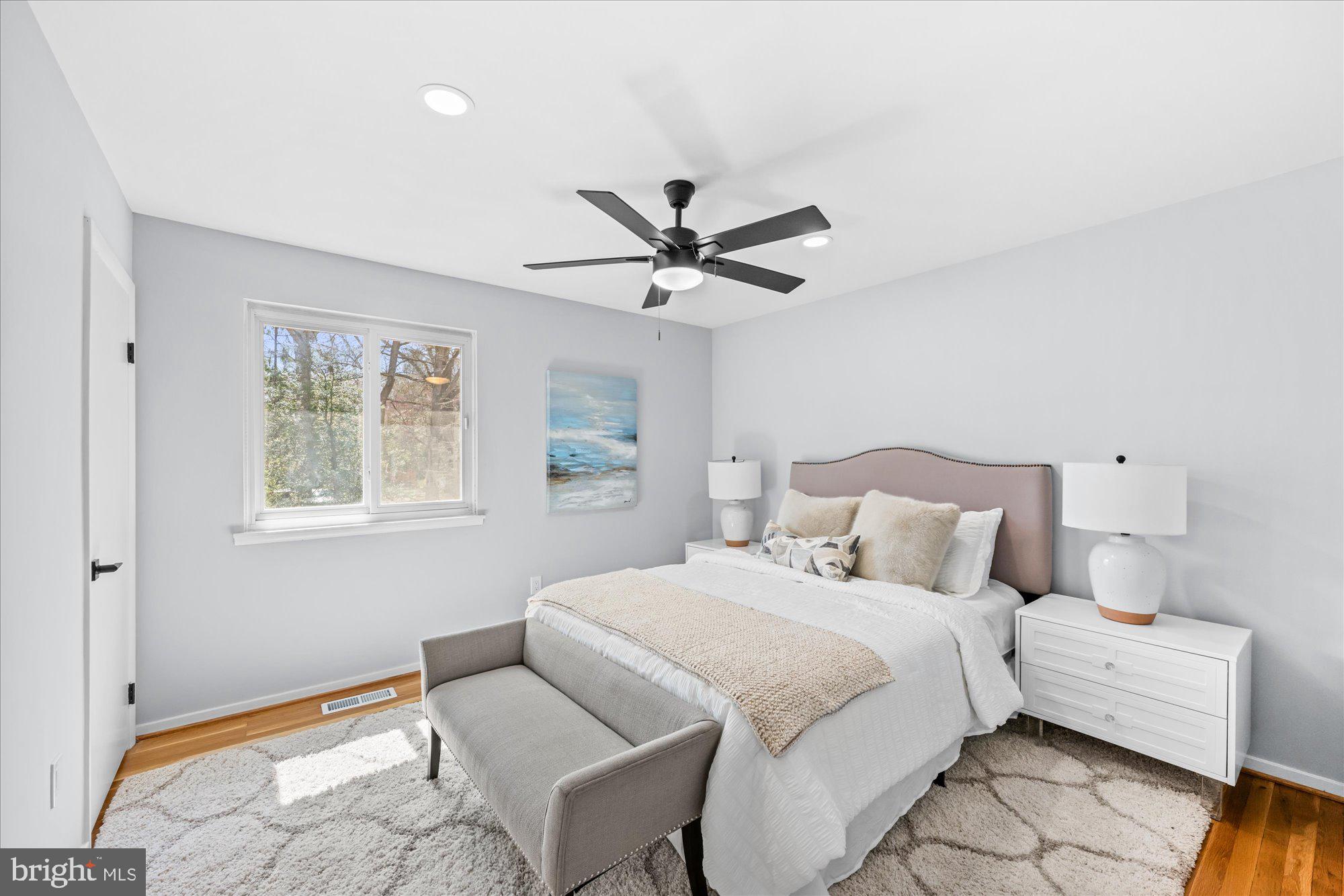 1431 Greenmont Court Reston, VA 20190 - Photo 8 of 16 a bedroom with bed and window