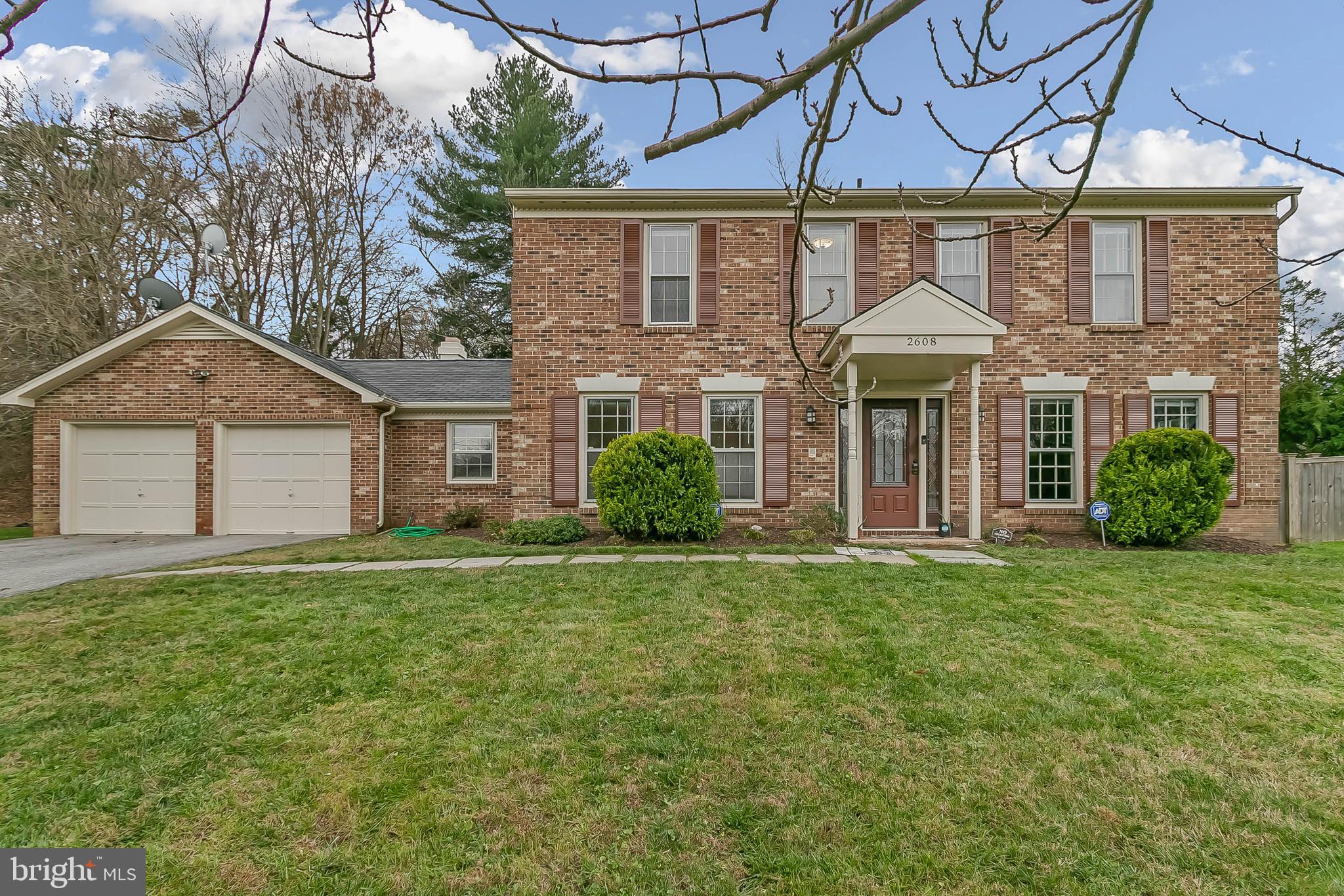 Center Hall Colonial with fenced backyard