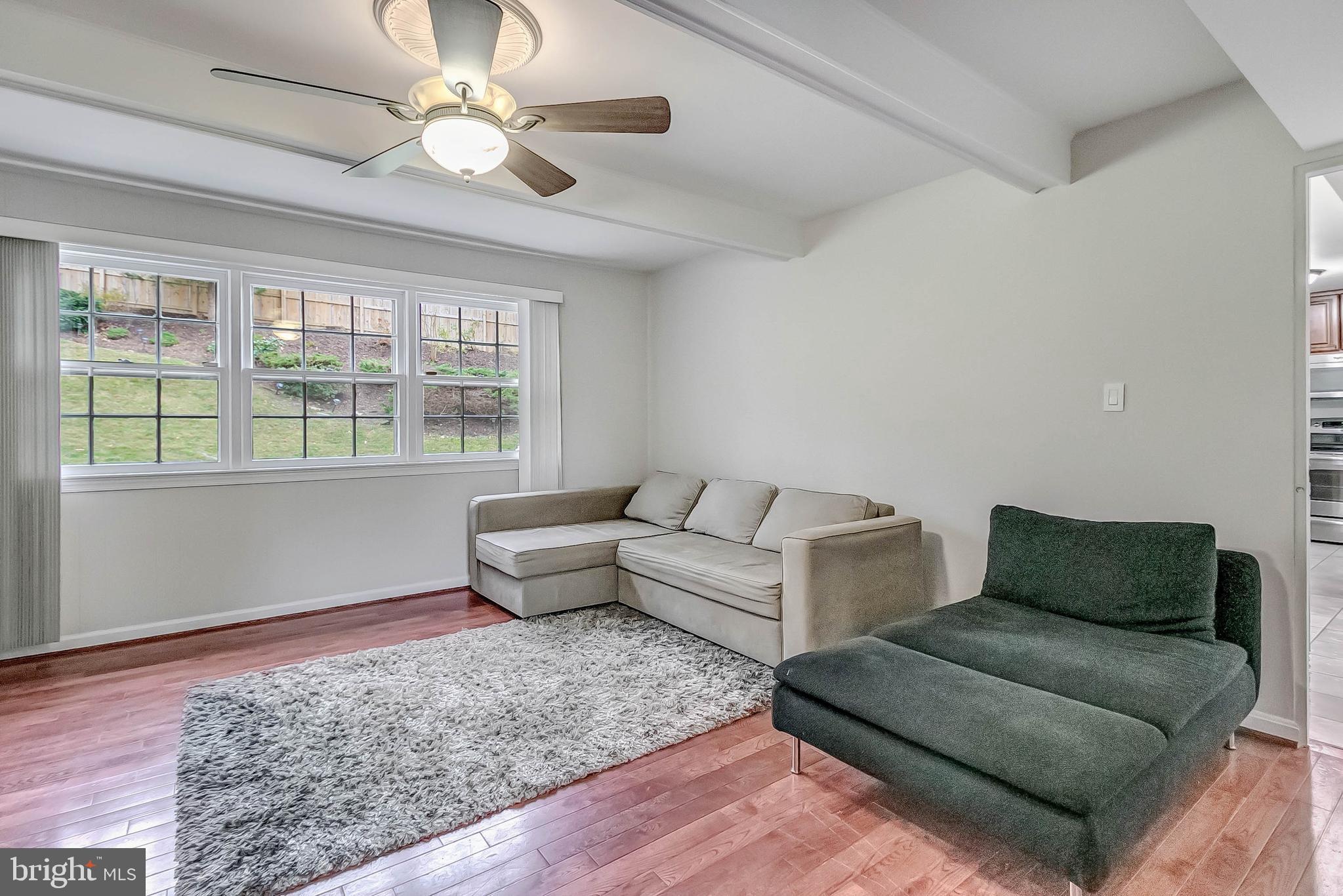 2608 Village Lane Silver Spring, MD 20906 - Photo 22 of 43 Family room with ceiling fan
