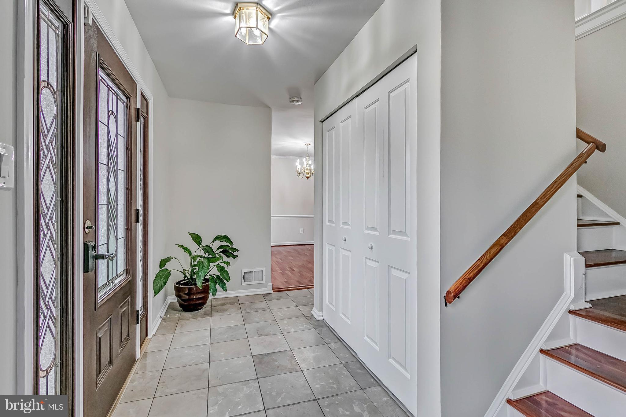 2608 Village Lane Silver Spring, MD 20906 - Photo 4 of 43 Foyer with ceramic tile and guest coat closet