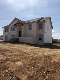 a front view of house with yard