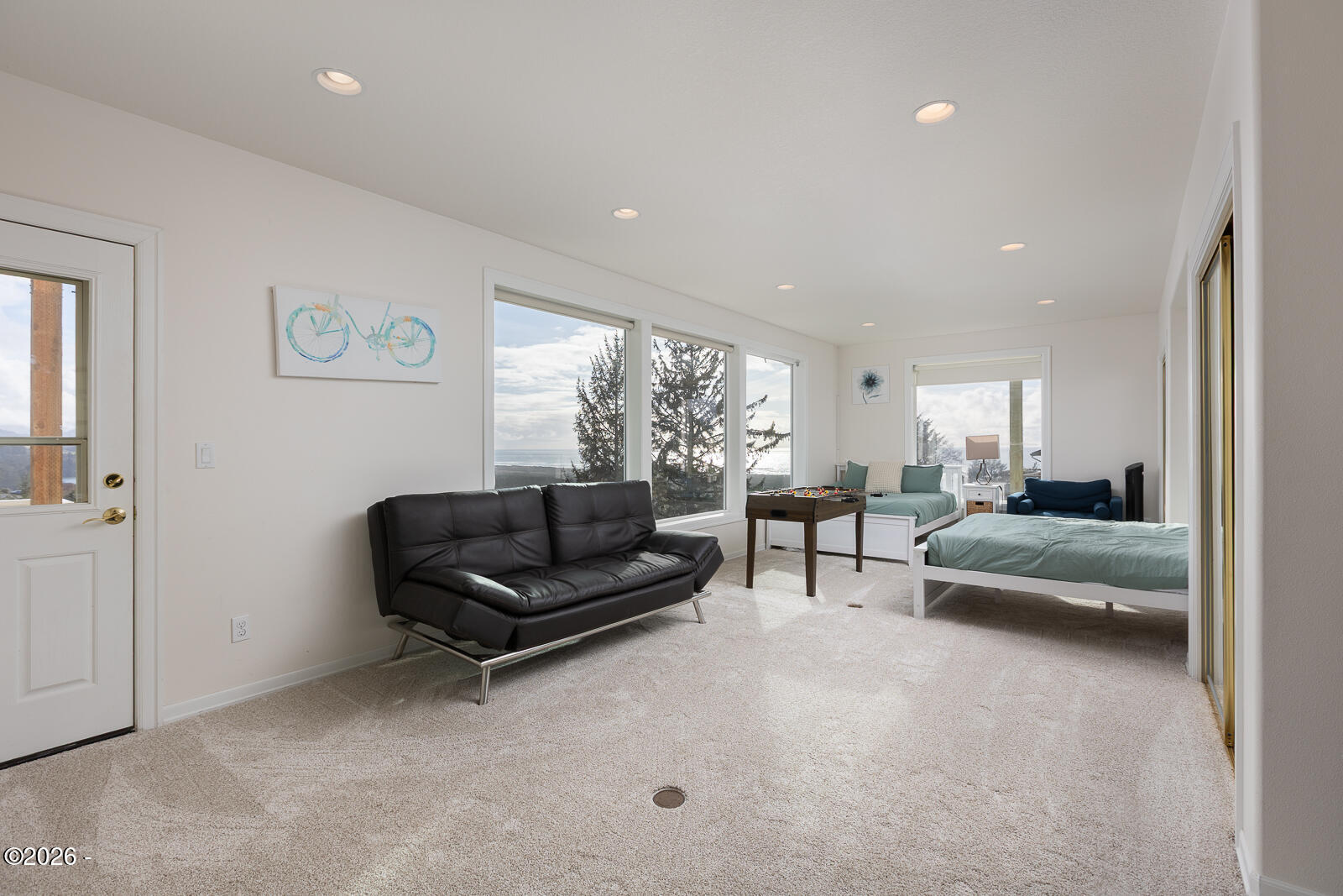 7415 East Summit Road Pacific City, OR 97135 - Photo 23 of 44 a living room with furniture and a large window