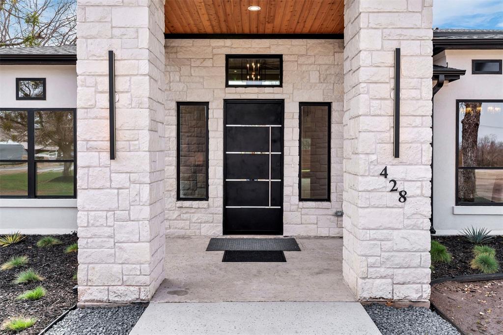 428 Squaw Creek Road Willow Park, TX 76087 - Photo 7 of 34 a front view of a building with a shower