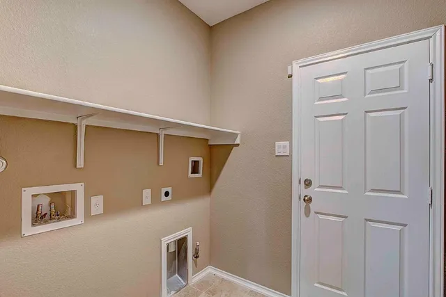 a view of a hallway with closet
