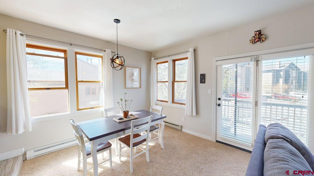 6 Ferringway Circle, Unit 47 Durango, CO 81301 - Photo 6 of 20 a view of a livingroom with furniture window and wooden floor