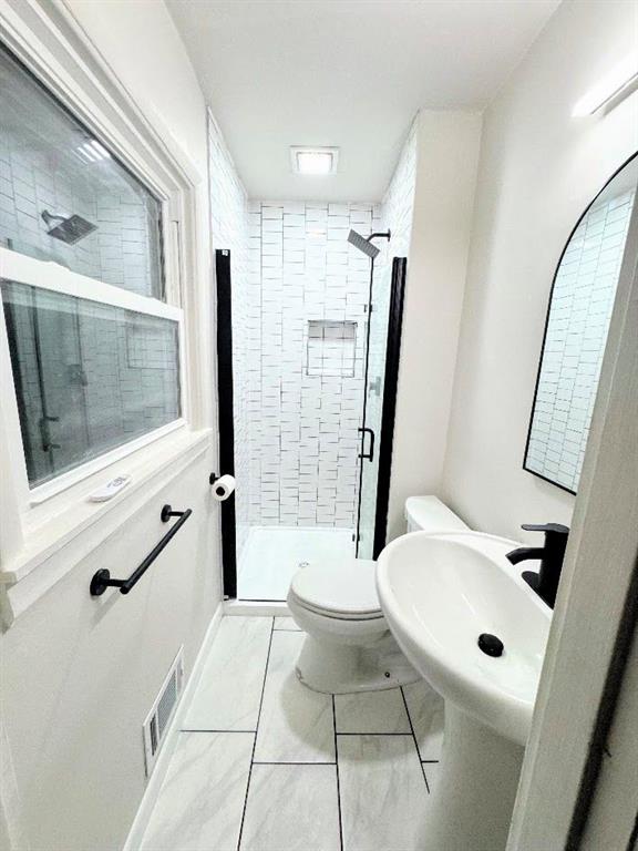 3807 Greenhill Drive Atlanta, GA 30341 - Photo 14 of 18 a bathroom with a sink a toilet and a mirror