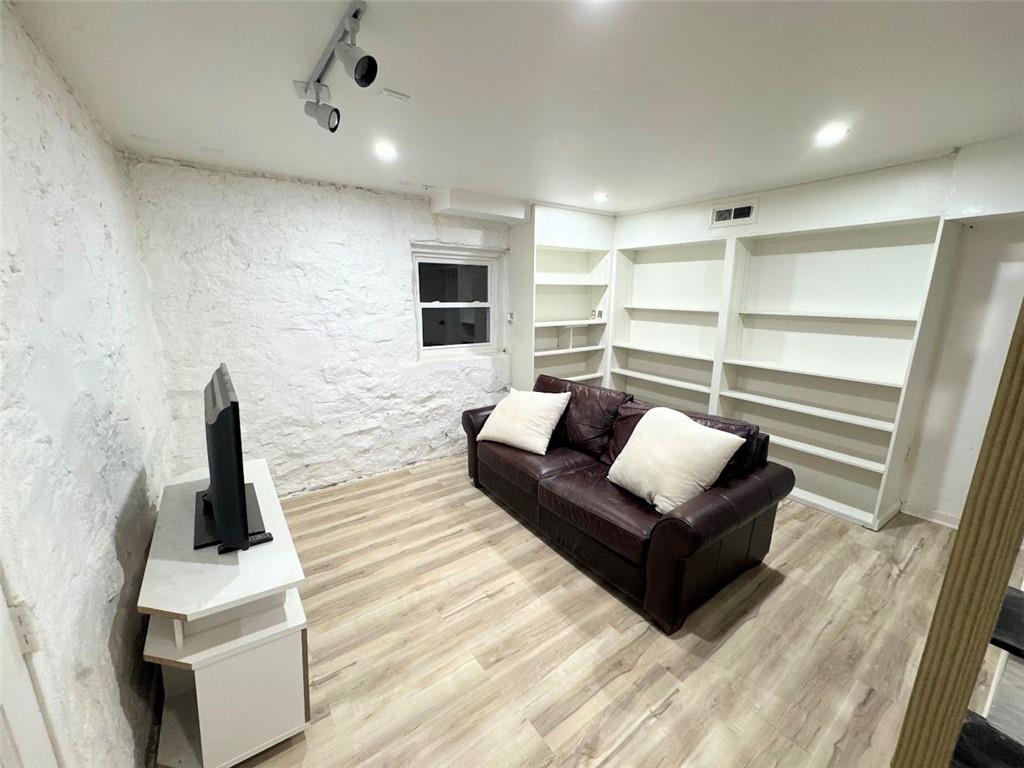 3807 Greenhill Drive Atlanta, GA 30341 - Photo 15 of 18 a living room with furniture and a flat screen tv