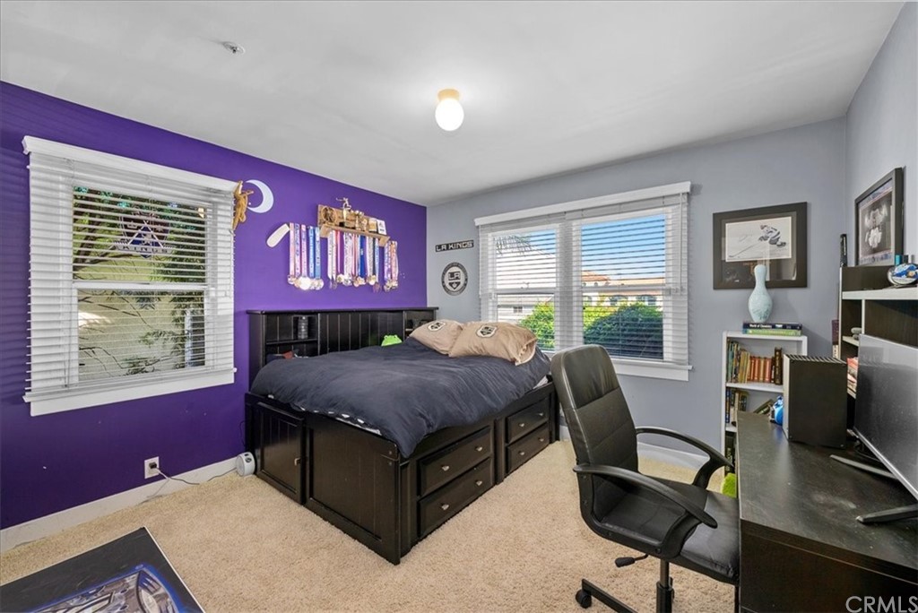 618 Ruby Street Redondo Beach, CA 90277 - Photo 16 of 50 a bed room with a bed and a desk