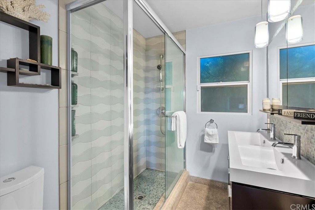 618 Ruby Street Redondo Beach, CA 90277 - Photo 17 of 50 a bathroom with a sink a toilet and shower